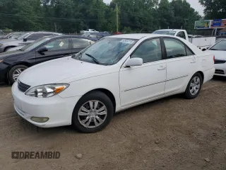 2004 Toyota Camry LE z VIN 4T1BE30K04U301360, wystawiony jako Copart lot #60804115 z przebiegiem 287 009 mil mil oraz Szkoda całkowita • Salvage title. Historia ofert i sprzedaży dostępna na DreamBid. Obrazek 1.