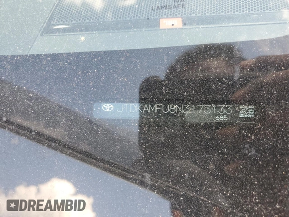 2022 Toyota Prius L Eco z VIN JTDKAMFU8N3173133, wystawiony jako Copart lot #54865615 z przebiegiem 100 876 mil mil oraz Szkoda całkowita • Salvage title. Historia ofert i sprzedaży dostępna na DreamBid. Obrazek 12.