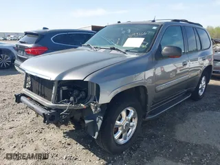 2005 GMC Envoy SLE with VIN 1GKDS13S452306939, listed as a IAAI auction lot 41931667 with 236,955 mi miles. Bid and sale history available at carsss.com. Image 18.