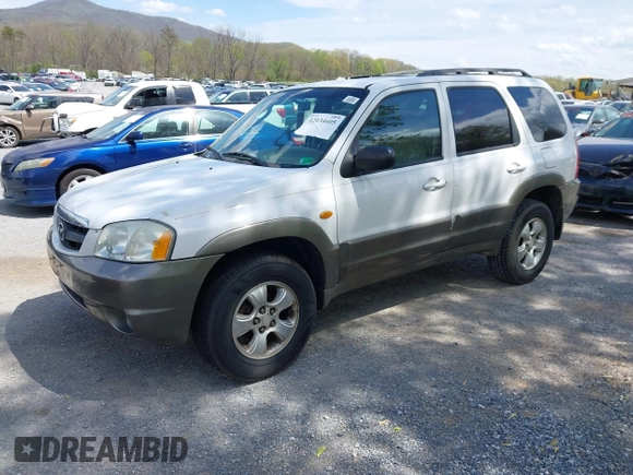 2001 Mazda Tribute LX with VIN 4F2YU09131KM12857, listed as a IAAI auction lot 42034605 with 257,015 mi miles and . Bid and sale history available at carsss.com. Image 2.