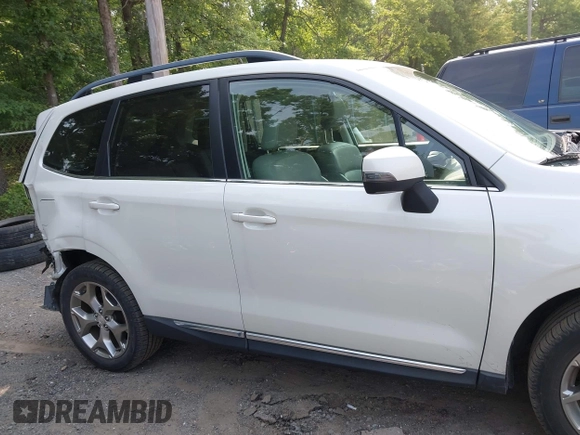 2015 Subaru Forester Touring with VIN JF2SJAWC9FH573973, listed as a IAAI auction lot 42380080 with 87,938 mi miles and . Bid and sale history available at DreamBid. Image 13.