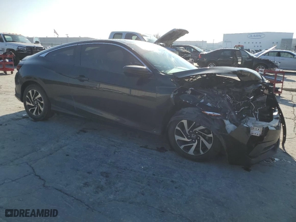 2017 Honda Civic Coupe LX-P with VIN 2HGFC4B07HH304022, listed as a Copart auction lot 82953274 with 85,132 mi miles and Salvage Title. Bid and sale history available at carsss.com. Image 4.