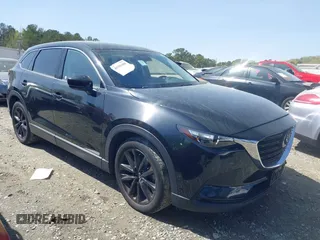 2023 Mazda CX-9 Touring Plus with VIN JM3TCBAY9P0657854, listed as a IAAI auction lot 41931409 with 54,036 mi miles and . Bid and sale history available at DreamBid. Image 13.