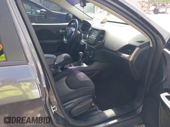 2016 Jeep Cherokee Sport with VIN 1C4PJLAB2GW351500, listed as a IAAI auction lot 42210874 with 148,165 mi miles and . Bid and sale history available at DreamBid. Image 5.