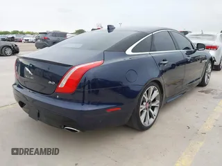 2018 Jaguar XJ R-Sport with VIN SAJWA1C74J8W14026, listed as a IAAI auction lot 42032719 with 95,263 mi miles and . Bid and sale history available at DreamBid. Image 4.