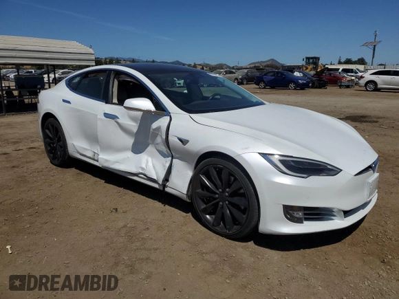 2017 Tesla Model S 100D с VIN 5YJSA1E27HF199003, выставлен на аукционе Copart как лот 59214775 с пробегом 99 673 миль миль и Списание • Salvage title. История ставок и продаж доступна на DreamBid. Изображение 4.