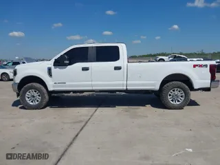 2019 Ford Super Duty F-250 SRW XL with VIN 1FT7W2BT9KEC89689, listed as a IAAI auction lot 40381550 with 214,406 mi miles. Bid and sale history available at carsss.com. Image 14.