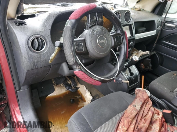 2016 Jeep Compass Sport with VIN 1C4NJDBB5GD779567, listed as a Copart auction lot 55808655 with Not provided miles and Salvage title. Bid and sale history available at DreamBid. Image 8.