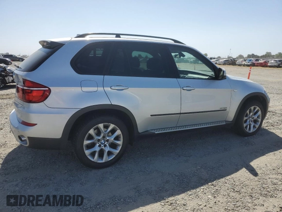 2012 BMW X5 35i with VIN 5UXZV4C5XCL751020, listed as a Copart auction lot 59327845 with 106,249 mi miles and Salvage title. Bid and sale history available at DreamBid. Image 3.