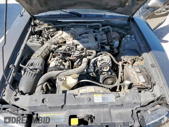 2002 Ford Mustang Standard with VIN 1FAFP40432F139383, listed as a Copart auction lot 52171375 with 100,793 mi miles and Salvage Title. Bid and sale history available at carsss.com. Image 11.