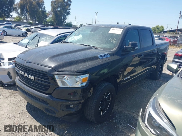 2021 Ram 1500 Big Horn z VIN 1C6SRFFT3MN791921, wystawiony jako IAAI lot #41970131 z przebiegiem 60 901 mil mil oraz . Historia ofert i sprzedaży dostępna na DreamBid. Obrazek 23.