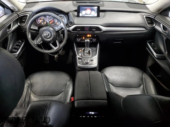 2017 Mazda CX-9 Touring with VIN JM3TCBCY5H0134295, listed as a Copart auction lot 63448185 with 174,248 mi miles and Salvage title. Bid and sale history available at DreamBid. Image 8.