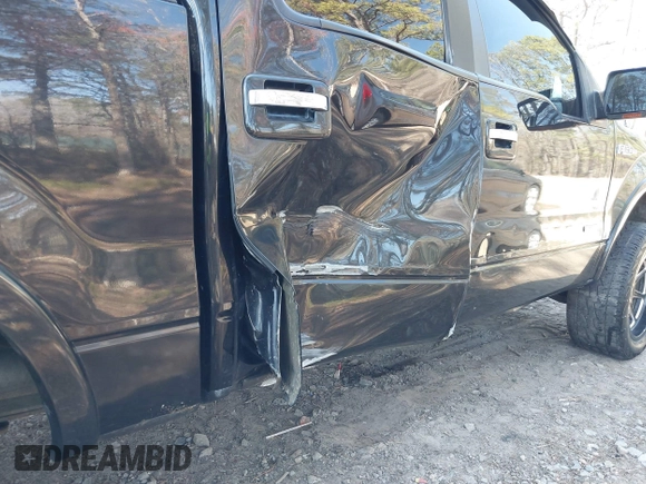 2011 Ford F-150 XLT with VIN 1FTFW1ET8BFA70797, listed as a IAAI auction lot 41909232 with 118,843 mi miles. Bid and sale history available at carsss.com. Image 18.