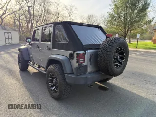 2014 Jeep Wrangler Unlimited Sport with VIN 1C4BJWDG0EL192509, listed as a Copart auction lot 54269205 with 50,701 mi miles and Clean Title. Bid and sale history available at carsss.com. Image 3.
