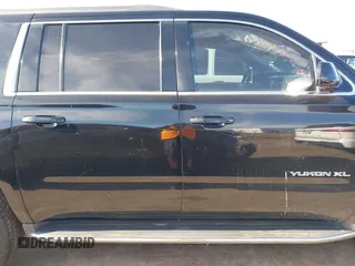 2016 GMC Yukon XL SLE with VIN 1GKS1FKC9GR442107, listed as a IAAI auction lot 41309092 with 130,117 mi miles. Bid and sale history available at carsss.com. Image 14.