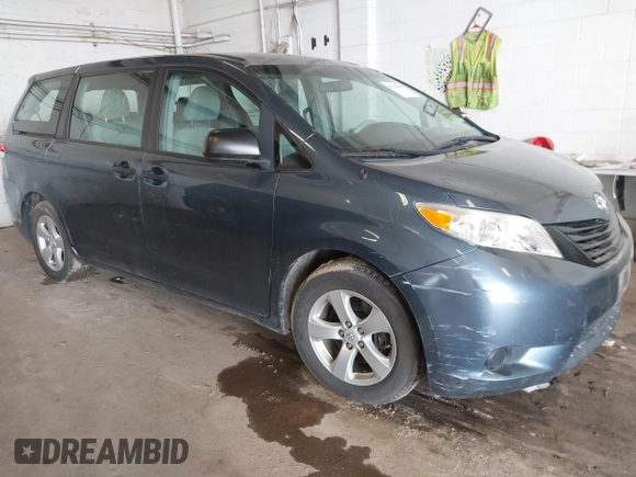2014 Toyota Sienna L with VIN 5TDZK3DCXES434910, listed as a IAAI auction lot 41731864 with 146,161 mi miles. Bid and sale history available at carsss.com. Image 1.