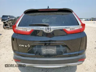 2019 Honda CR-V EX z VIN 7FARW1H52KE039158, wystawiony jako Copart lot #57277265 z przebiegiem 67 764 mil mil oraz Szkoda całkowita • Salvage title. Historia ofert i sprzedaży dostępna na DreamBid. Obrazek 6.