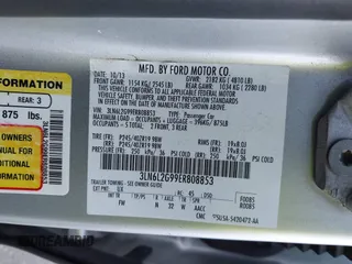 2014 Lincoln MKZ with VIN 3LN6L2G99ER808853, listed as a IAAI auction lot 42157083 with 157,696 mi miles. Bid and sale history available at carsss.com. Image 9.
