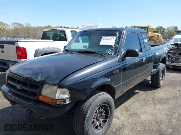 1999 Ford Ranger XL with VIN 1FTZR15V3XPB55652, listed as a IAAI auction lot 41892631 with 238,995 mi miles. Bid and sale history available at carsss.com. Image 2.