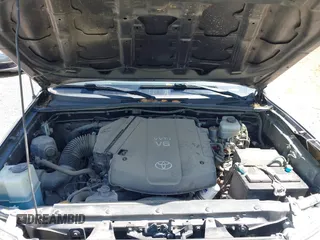 2014 Toyota Tacoma with VIN 5TFLU4ENXEX103129, listed as a IAAI auction lot 42230976 with 191,982 mi miles and . Bid and sale history available at DreamBid. Image 10.