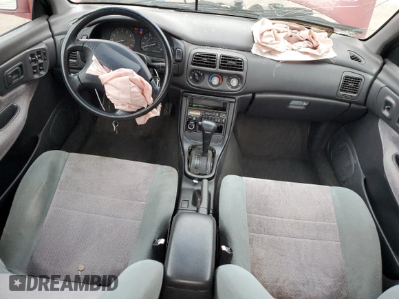 1996 Subaru Impreza with VIN JF1GC4557TH512593, listed as a Copart auction lot 74099464 with 112,437 mi miles and Salvage title. Bid and sale history available at DreamBid. Image 8.