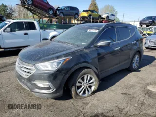 2018 Hyundai Santa Fe 2.0T z VIN 5NMZU4LA7JH107698, wystawiony jako Copart lot #56174225 z przebiegiem 106 681 mil mil oraz Szkoda całkowita • Salvage title. Historia ofert i sprzedaży dostępna na DreamBid. Obrazek 1.
