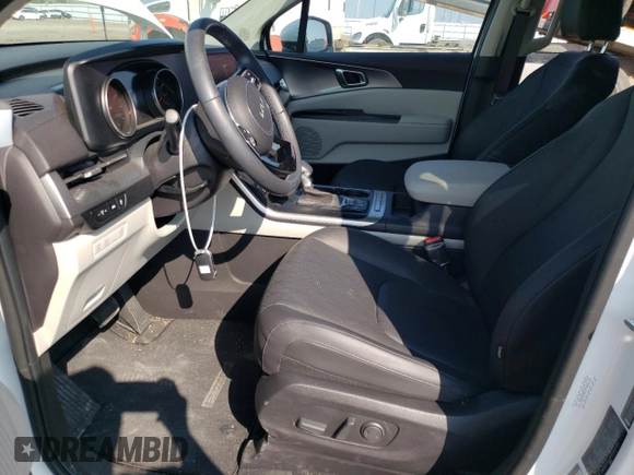 2023 Kia Carnival LX with VIN KNDNB4H35P6260181, listed as a Copart auction lot 74240714 with 6,879 mi miles and Salvage Title. Bid and sale history available at carsss.com. Image 7.