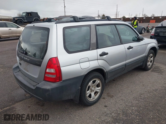 2003 Subaru Forester X with VIN JF1SG63633G728520, listed as a IAAI auction lot 41808658 with 104,084 mi miles. Bid and sale history available at carsss.com. Image 4.
