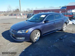 2015 Volkswagen Passat 1.8T SE w/Sunroof & Nav with VIN 1VWBT7A30FC010548, listed as a IAAI auction lot 41363214 with 80,284 mi miles. Bid and sale history available at carsss.com. Image 17.