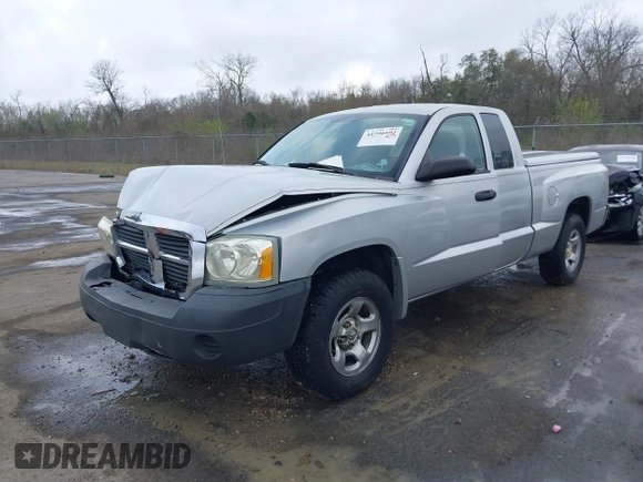 2005 Dodge Dakota ST with VIN 1D7HE22K25S119460, listed as a IAAI auction lot 41790592 with 104,995 mi miles and . Bid and sale history available at DreamBid. Image 2.
