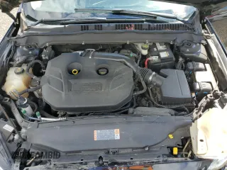 2017 Ford Fusion SE z VIN 3FA6P0H96HR150012, wystawiony jako Copart lot #56789925 z przebiegiem 167 772 mil mil oraz Szkoda całkowita • Salvage title. Historia ofert i sprzedaży dostępna na DreamBid. Obrazek 11.