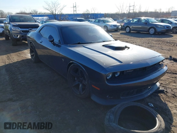 2016 Dodge Challenger R/T Scat Pack z VIN 2C3CDZFJ1GH249729, wystawiony jako IAAI lot #41589369 z przebiegiem 44 555 mil mil oraz . Historia ofert i sprzedaży dostępna na DreamBid. Obrazek 1.