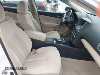 2014 Nissan Maxima S with VIN 1N4AA5AP7EC499224, listed as a IAAI auction lot 42014369 with 74,399 mi miles and . Bid and sale history available at DreamBid. Image 5.