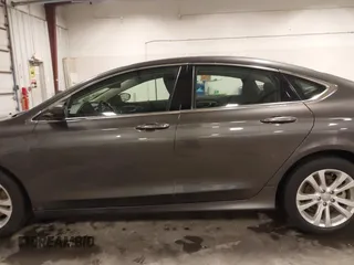 2015 Chrysler 200 Limited with VIN 1C3CCCAB0FN607876, listed as a IAAI auction lot 41882675 with 136,146 mi miles. Bid and sale history available at carsss.com. Image 14.