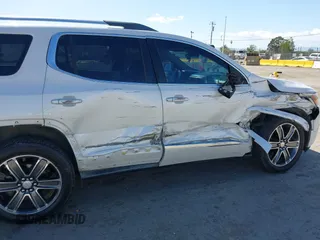 2017 GMC Acadia Denali z VIN 1GKKNXLS4HZ162970, wystawiony jako IAAI lot #42266517 z przebiegiem 60 605 mil mil oraz . Historia ofert i sprzedaży dostępna na DreamBid. Obrazek 6.