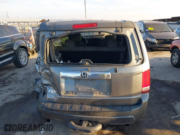 2009 Honda Pilot LX z VIN 5FNYF38259B009896, wystawiony jako IAAI lot #41506720 z przebiegiem 242 072 mil mil oraz . Historia ofert i sprzedaży dostępna na DreamBid. Obrazek 16.
