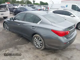 2015 Infiniti Q50 Premium z VIN JN1BV7AR7FM408015, wystawiony jako IAAI lot #42083301 z przebiegiem 58 817 mil mil oraz . Historia ofert i sprzedaży dostępna na DreamBid. Obrazek 3.