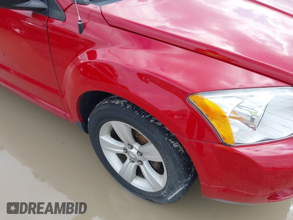 2011 Dodge Caliber Mainstreet z VIN 1B3CB3HA6BD209214, wystawiony jako IAAI lot #42185498 z przebiegiem 114 040 mil mil oraz . Historia ofert i sprzedaży dostępna na DreamBid. Obrazek 6.