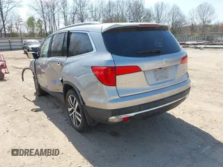 2017 Honda Pilot Touring with VIN 5FNYF6H98HB100335, listed as a IAAI auction lot 41907709 with 1 mi miles. Bid and sale history available at carsss.com. Image 3.