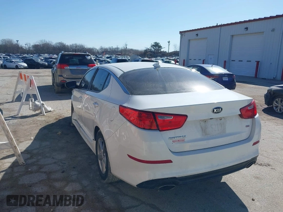 2014 Kia Optima LX with VIN 5XXGM4A73EG322983, listed as a IAAI auction lot 41708101 with 84,334 mi miles. Bid and sale history available at carsss.com. Image 3.
