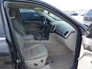 2012 Jeep Grand Cherokee Laredo with VIN 1C4RJEAG2CC259279, listed as a IAAI auction lot 41768024 with 185,161 mi miles. Bid and sale history available at carsss.com. Image 5.