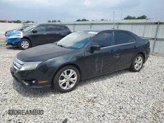 2012 Ford Fusion SE with VIN 3FAHP0HA1CR304105, listed as a Copart auction lot 62777285 with 220,306 mi miles and Clean title. Bid and sale history available at DreamBid. Image 1.