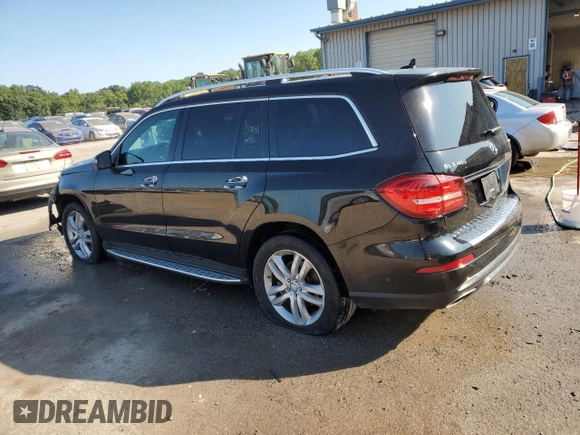 2017 Mercedes-Benz GLS 450 with VIN 4JGDF6EE9HA874694, listed as a Copart auction lot 69668974 with 128,694 mi miles and Salvage Title. Bid and sale history available at DreamBid. Image 2.