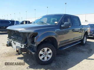 2015 Ford F-150 XLT with VIN 1FTEW1EF4FKE72884, listed as a IAAI auction lot 41833903 with 196,597 mi miles. Bid and sale history available at carsss.com. Image 2.