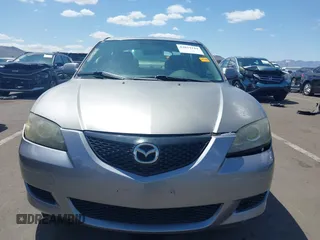 2006 Mazda Mazda3 i with VIN JM1BK12G161465537, listed as a IAAI auction lot 42074144 with 167,823 mi miles. Bid and sale history available at carsss.com. Image 12.