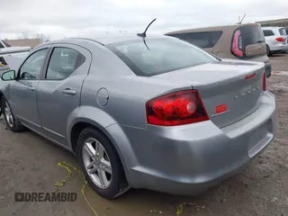 2013 Dodge Avenger SXT with VIN 1C3CDZCB2DN665997, listed as a IAAI auction lot 42011394 with Not Provided miles and . Bid and sale history available at carsss.com. Image 3.