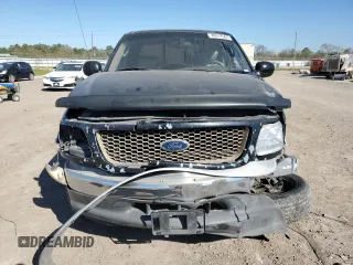 2003 Ford F-150 XLT with VIN 1FTRW07L73KA28876, listed as a Copart auction lot 49319565 with 290,880 mi miles and Salvage Title. Bid and sale history available at carsss.com. Image 5.