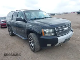 2011 Chevrolet Suburban LT with VIN 1GNSKJE37BR383811, listed as a IAAI auction lot 42115266 with 241,871 mi miles. Bid and sale history available at carsss.com. Image 1.