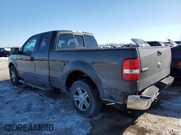 2005 Ford F-150 XLT with VIN 1FTPX12555FB05467, listed as a Copart auction lot 45712335 with 401,186 mi miles and Salvage Title. Bid and sale history available at carsss.com. Image 2.