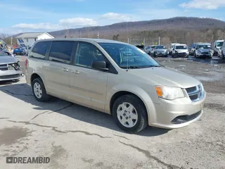2012 Dodge Grand Caravan SE with VIN 2C4RDGBG3CR385529, listed as a IAAI auction lot 41506810 with 153,300 mi miles. Bid and sale history available at carsss.com. Image 1.